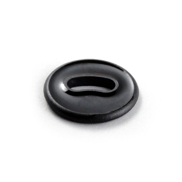 Back side of a black oval hole button